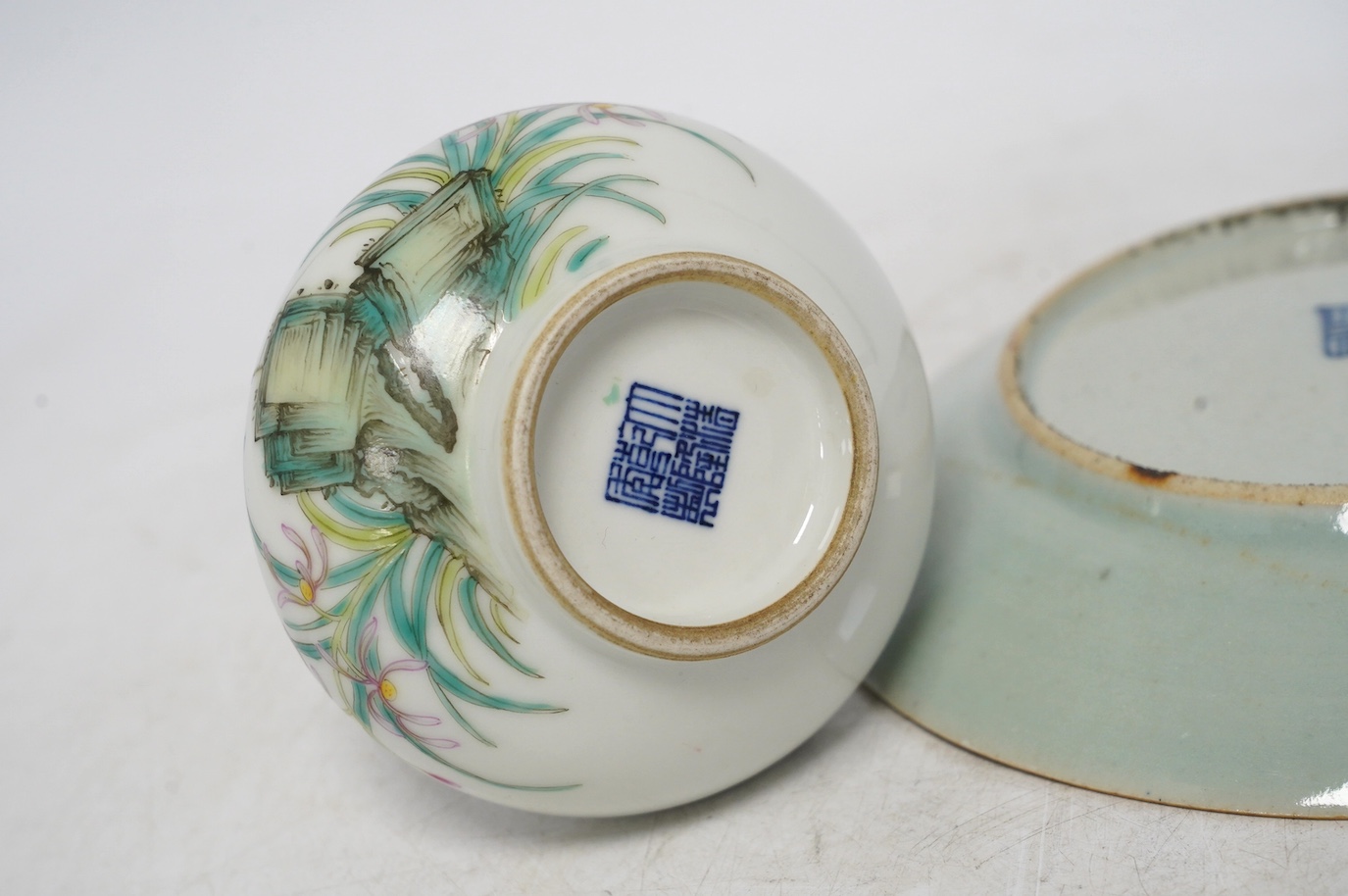 A group Oriental ceramics including Chinese famille rose plates, various tea bowls, a teapot, vases etc., tallest blue and white vase 21.5cm high (28). Condition - fair